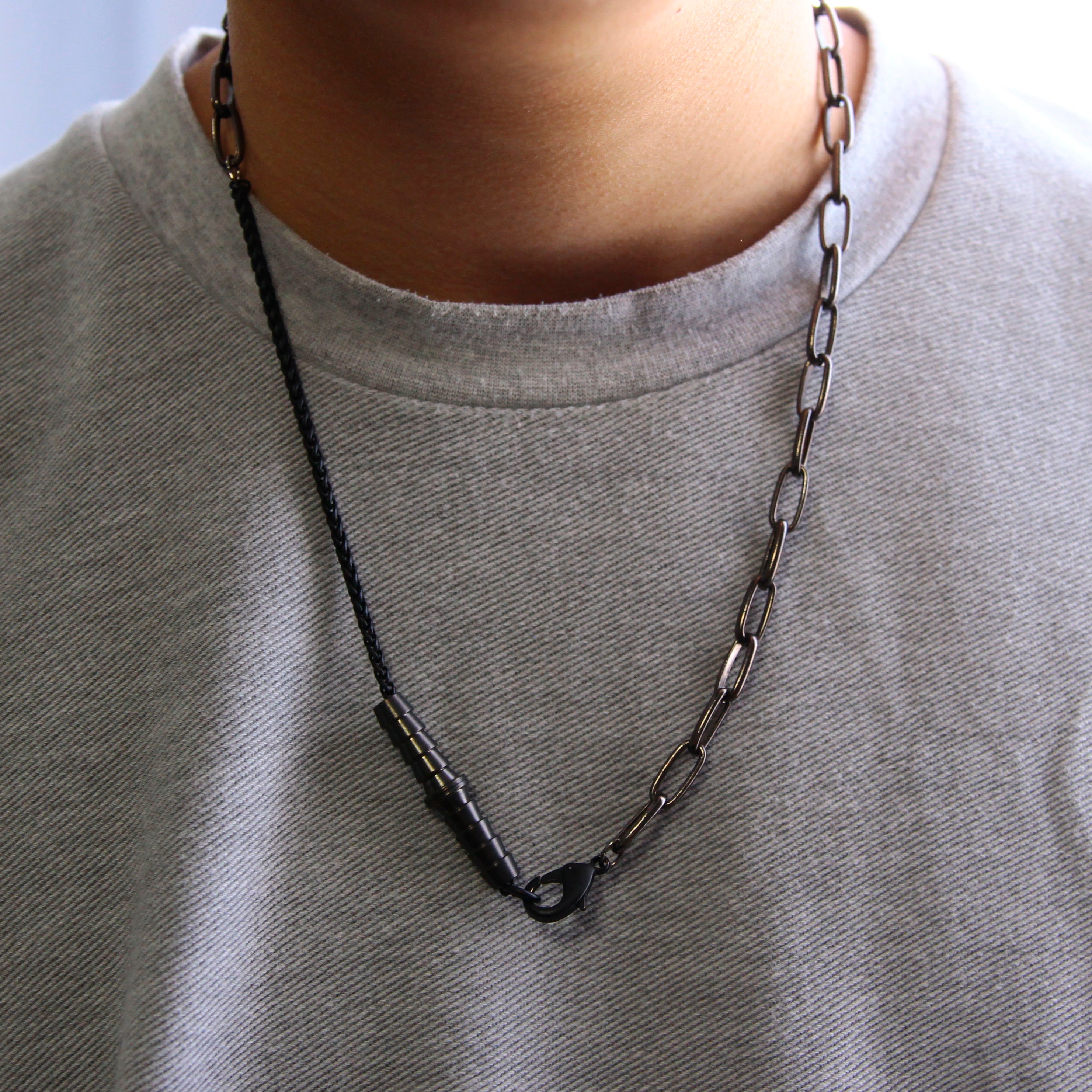 Black Chain Pendant on Male Model. Two different chain thickness with large lobster clasp and nipple stopper hardware